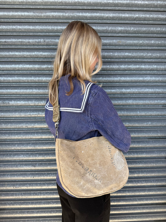 “J.D. BAKER” MINI NEWSBOY. 02.